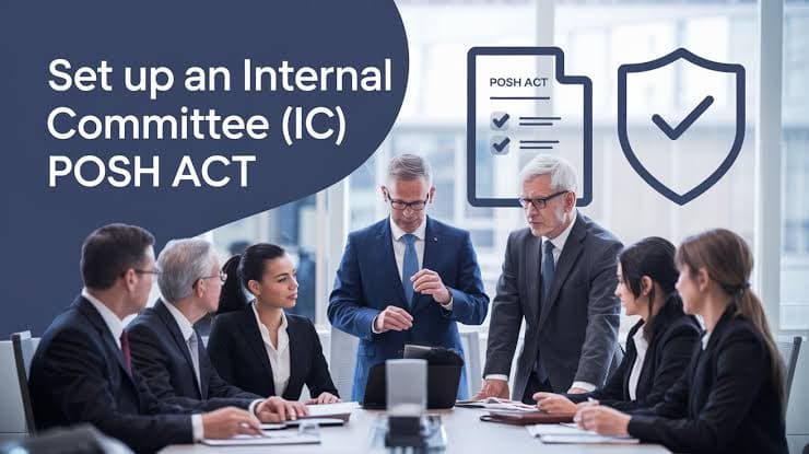 Indian startup founder reviewing POSH compliance checklist and ICC setup documents at office desk